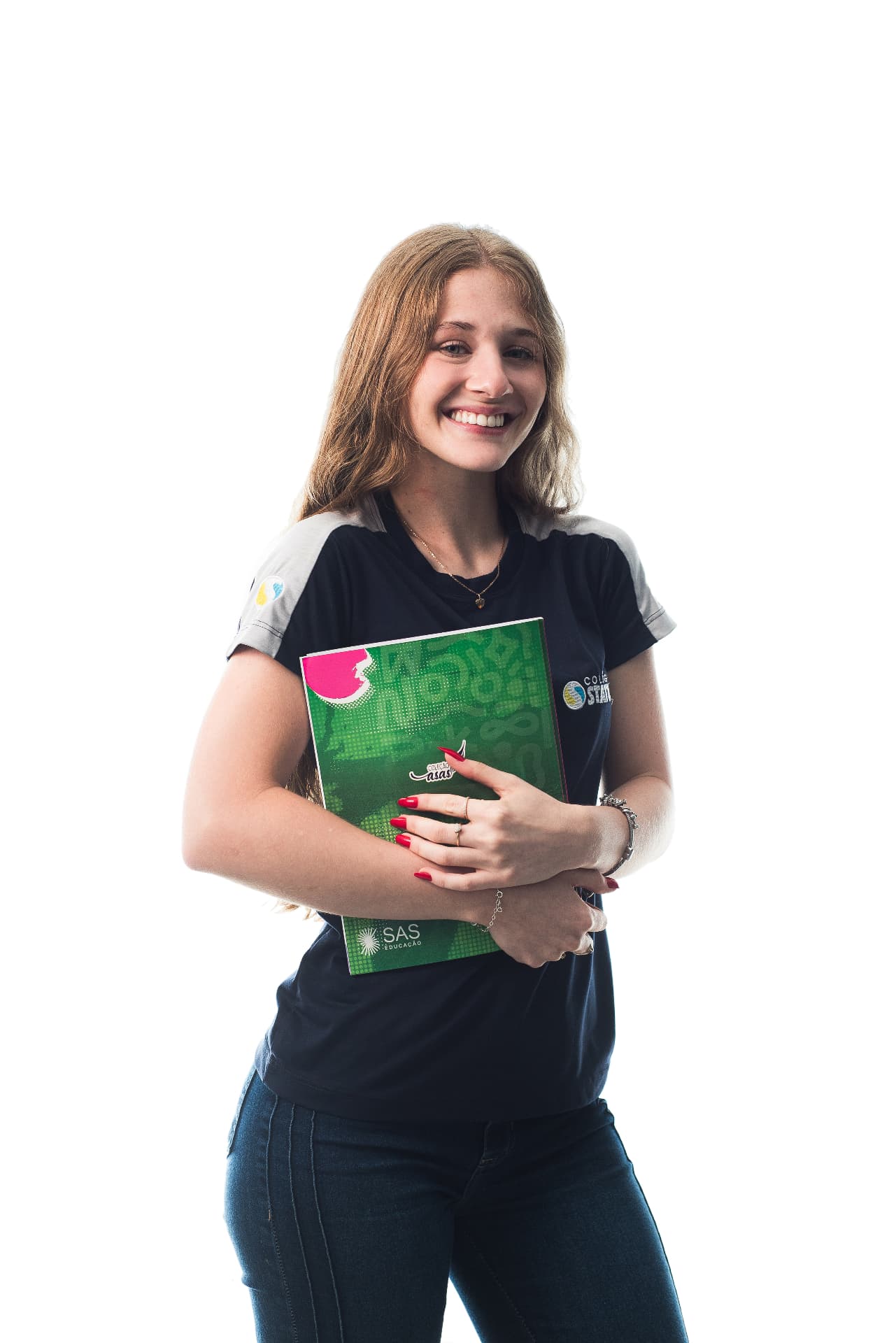 Estudante do Colégio Status com material didático